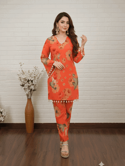 Vibrant Orange Floral Salwar Kameez with Pearl Details